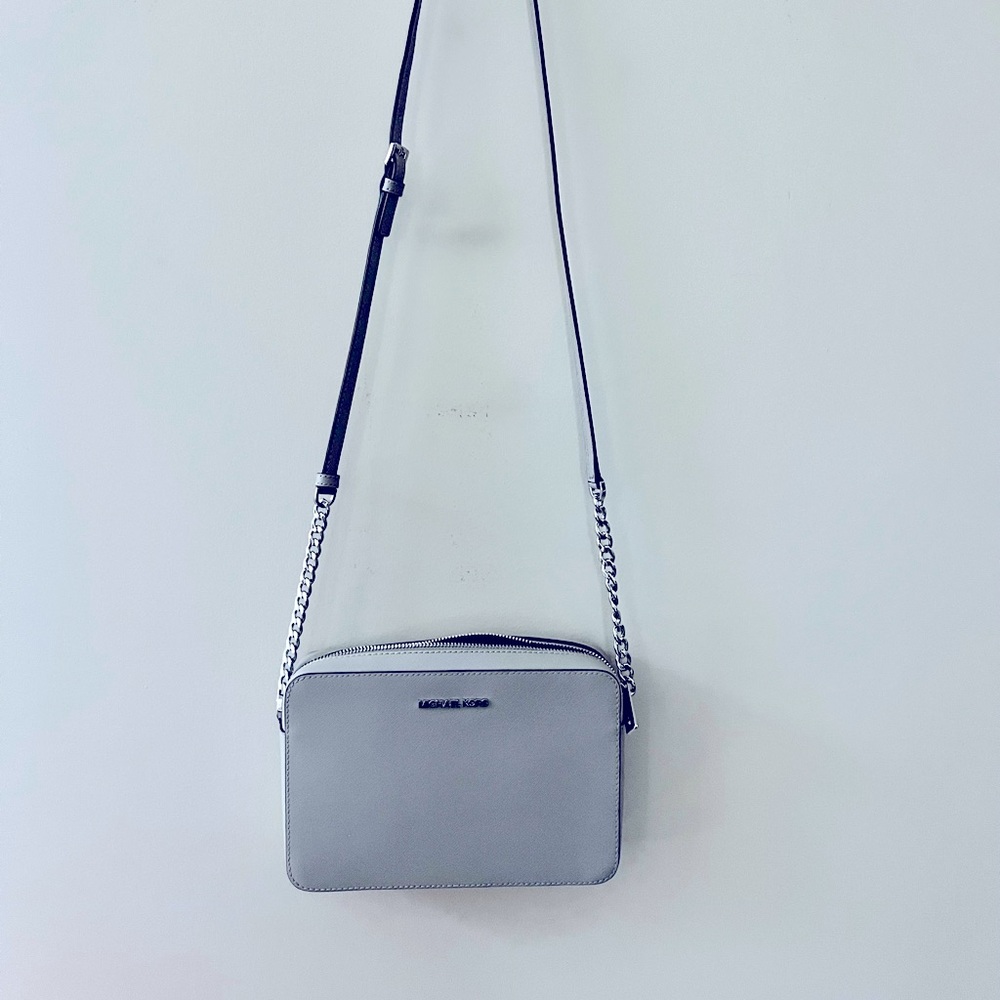 Completely new, never used Michael Kors crossbody bag.